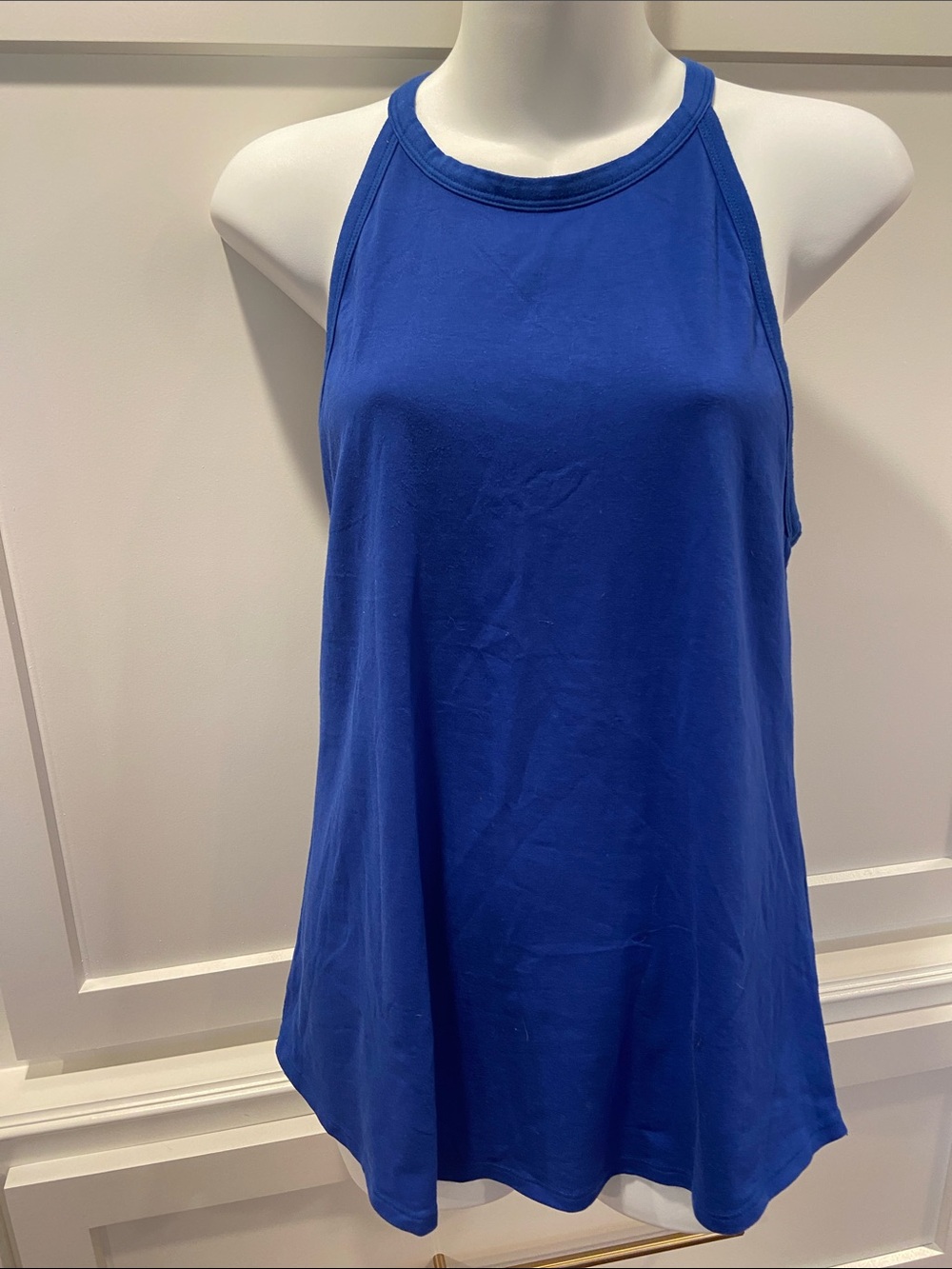 Under Armour 1. Royal Blue and 2. Black Racerback Swing Tank. Price is for both